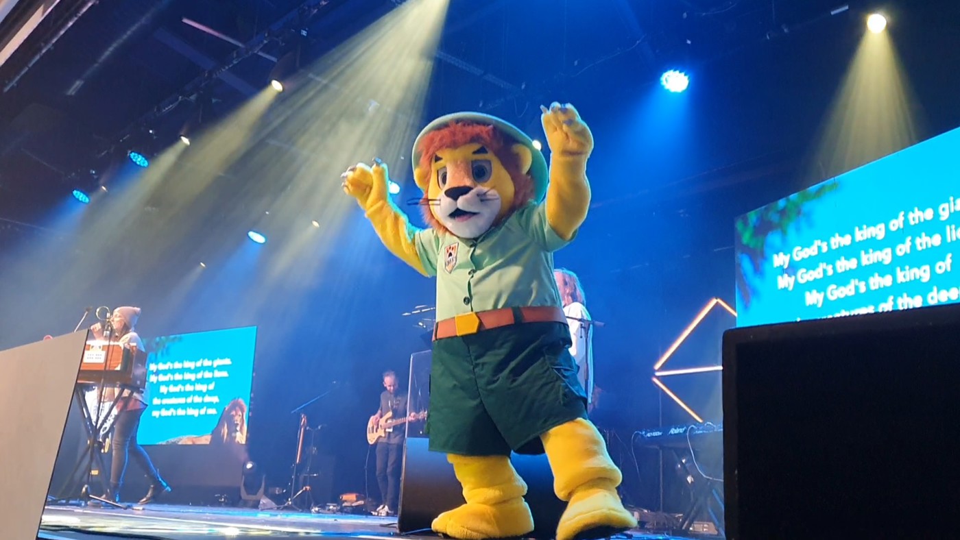 Roarry the lion on stage at Spring Harvest 2023