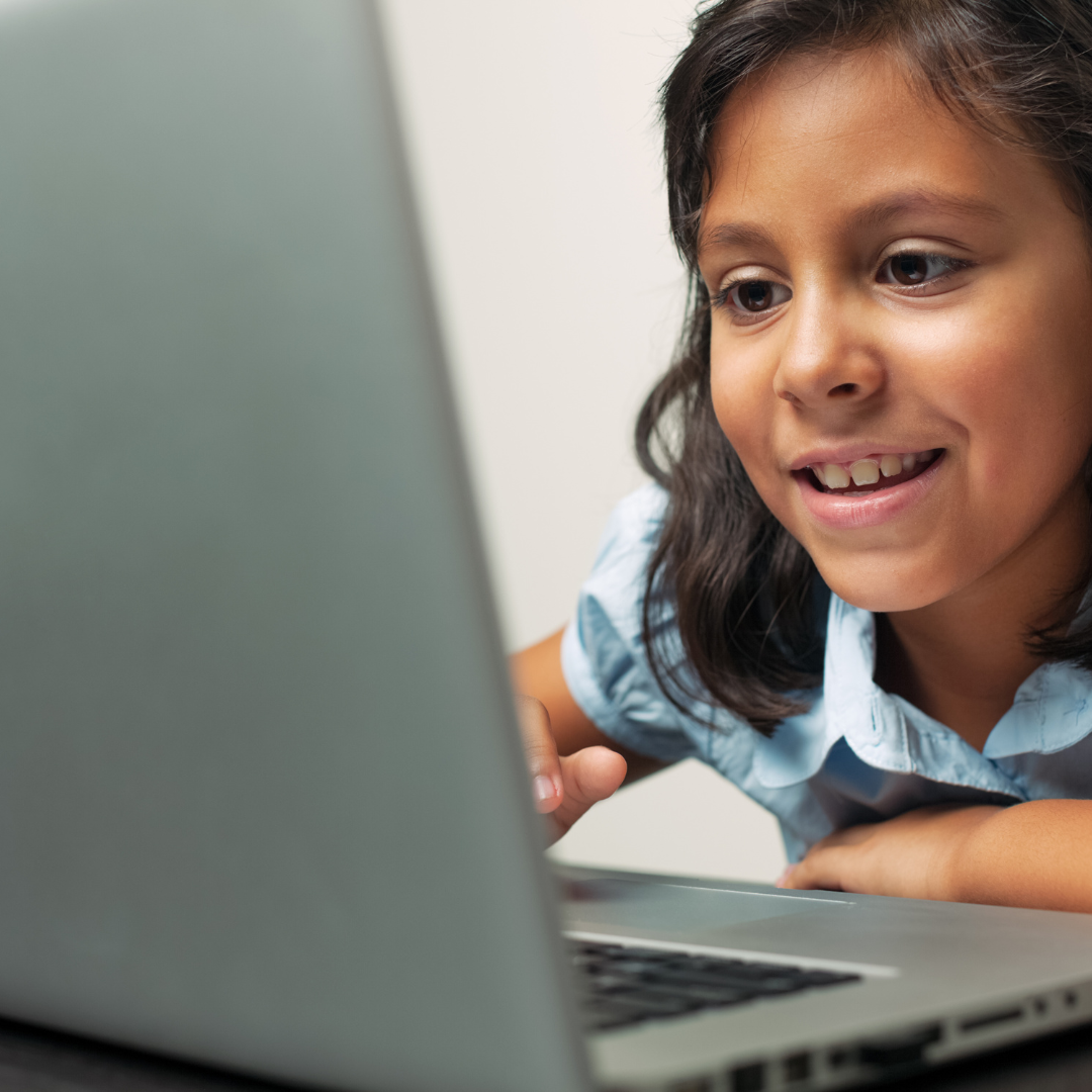 A girl using a laptop