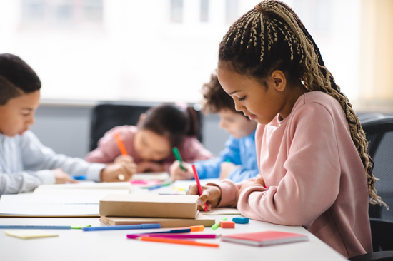 Child sat at desk