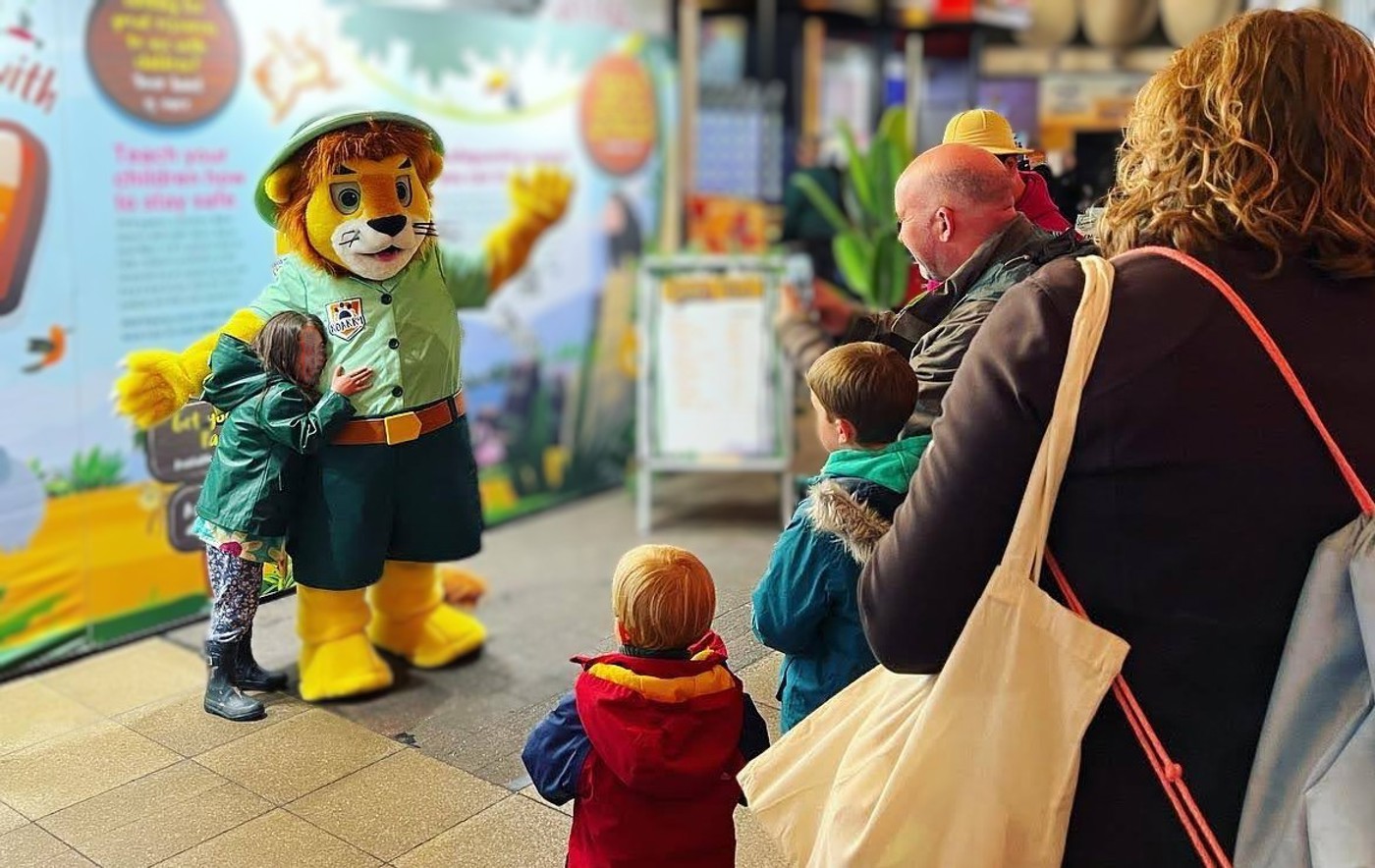 Roarry the lion meeting children and families