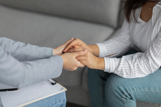 Someone holding someones hands
